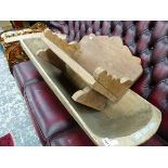 A RUSTIC WOODEN TRUG AND A HARDWOOD STOOL.