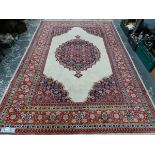 AN ORIENTAL CARPET OF TABRIZ DESIGN, 312 x 195cm