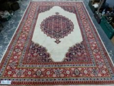 AN ORIENTAL CARPET OF TABRIZ DESIGN, 312 x 195cm