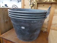 A SET OF FOUR LARGE TWO HANDLED GALVANIZED PLANTERS / BUCKETS.