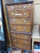 A GEORGE III STYLE WALNUT SMALL CHEST ON CHEST WITH BRUSHING SLIDE. H 161 X W 69 X D 48cms.