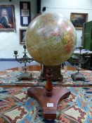 AN EARLY 20th.C. "GEOGRAPHIA" 10" TERRESTRIAL GLOBE WITH GILT BRASS SCALE ON STAINED WOOD STAND.