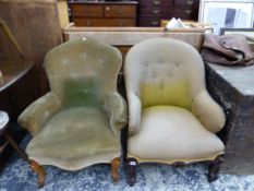 TWO SIMILAR VICTORIAN BUTTON BACK ARM CHAIRS ON CARVED FORE LEGS.
