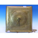 AN ARTS AND CRAFTS BRASS FACED WALL CLOCK, THE MOVEMENT CHIMING ON THREE RODS, THE BRASS SQUARE DIAL