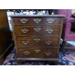 A 19th C. MAHOGANY CHEST OF FOUR GRADED DRAWERS ON BRACKET FEET, THE TOP CROSS BANDED. W 61 x D 47 x