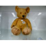 A VINTAGE JOINTED TEDDY BEAR