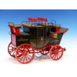 A SCALE MODEL OF A SIGN WRITTEN PLYMOUTH, EXETER CARRIAGE. APPROX LENGTH 35cms.