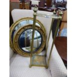 TWO SMALL WALL MIRRORS AND A BRASS STICK STAND.