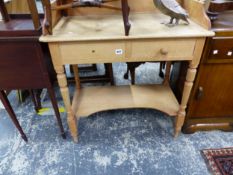 AN ANTIQUE PINE GALLERY TOP WASHSTAND.