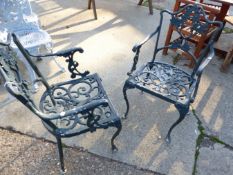 A PAIR OF CAST METAL GARDEN CHAIRS