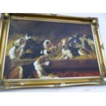 A DECORATIVE SWEPT GILT FRAMED PICTURE OF DOGS. SIGNED INDISTINCTLY. 60 x 90cms