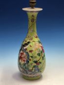 A CHINESE GREEN GROUND BALUSTER VASE AS A LAMP, THE BODY PAINTED WITH A MAGPIE AMONGST FLOWERS IN