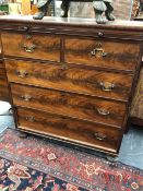 A VICTORIAN MAHOGANY CHEST IN TWO HALVES, A BRUSHING SLIDE ABOVE TWO SHORT AND THREE GRADED LONG