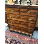 A VICTORIAN MAHOGANY CHEST IN TWO HALVES, A BRUSHING SLIDE ABOVE TWO SHORT AND THREE GRADED LONG