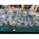 A QUANTITY OF GLASS INCLUDING VASES, CAKE STANDS, SALAD BOWLS ETC.