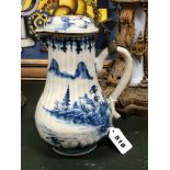 AN 18th C. CHINESE BLUE AND WHITE RIBBED BALUSTER JUG AND COVER PAINTED WITH PAGODAS AND PAVILIONS O