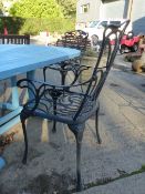 FOUR CAST METAL CHAIRS