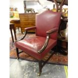 A GEORGE III MAHOGANY GAINSBOROUGH CHAIR CLOSE NAIL UPHOLSTERED IN RED LEATHER, THE SQUARE SECTIONED