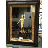 A MID 19th C. GILT METAL PROFILE OF THE CLOWN TONKINSON TIGHT ROPE WALKING, IN AN EBONISED FRAME.