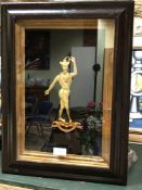 A MID 19th C. GILT METAL PROFILE OF THE CLOWN TONKINSON TIGHT ROPE WALKING, IN AN EBONISED FRAME.