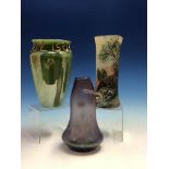 A CYLINDRICAL GLASS VASE WITH HEXAGONAL RIM DECORATED WITH A SHEPERDESS BELOW A TREE. H 23cms. GREEN