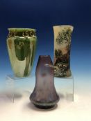 A CYLINDRICAL GLASS VASE WITH HEXAGONAL RIM DECORATED WITH A SHEPERDESS BELOW A TREE. H 23cms. GREEN