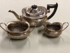 A HALLMARKED SILVER THREE PART TEASET COMPRISING OF A TEAPOT, SUGAR BOWL AND CREAMER DATED 1936