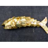 A CROWN TOP BOTTLE OPENER,SHELL FLEXI FISH