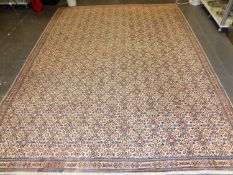 A PERSIAN CARPET OF UNUSUAL DESIGN, 310 x 228cms