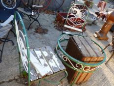 WROUGHT IRON GARDEN TABLE AND THREE MATCHING CHAIRS AND A WOODEN CRATE