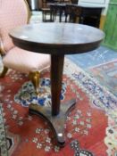 A 19th C. ROSEWOOD WINE TABLE WITH THE CIRCULAR TOP SUPPORTED ON AN HEXAGONAL COLUMN TAPERING TO A