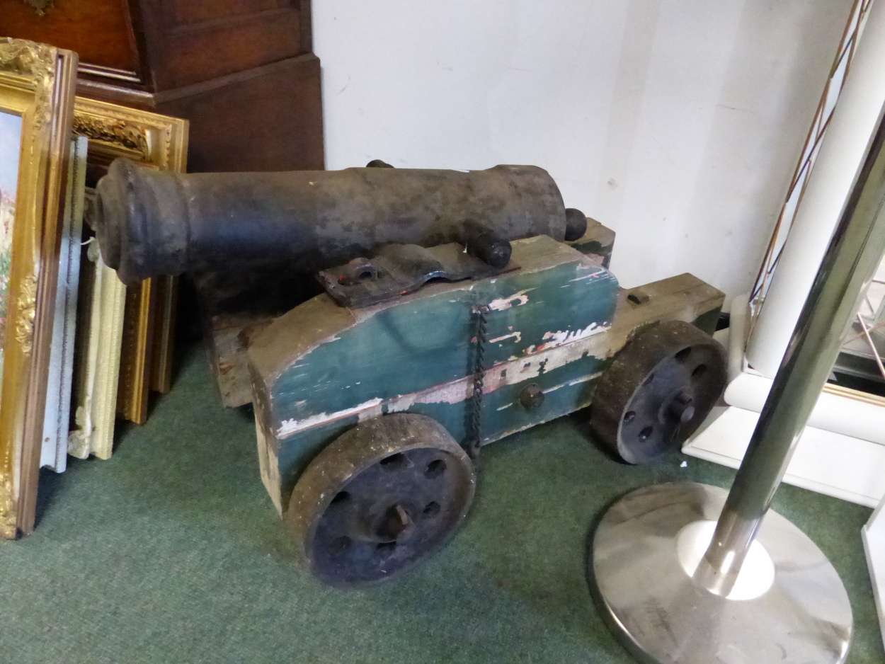 A PAIR OF ANTIQUE CANNONS ON WOODEN CARRIAGES, THE BARRELS. W 72cms. THE BARREL MOUTH. Dia. 5.5cms. - Image 4 of 8