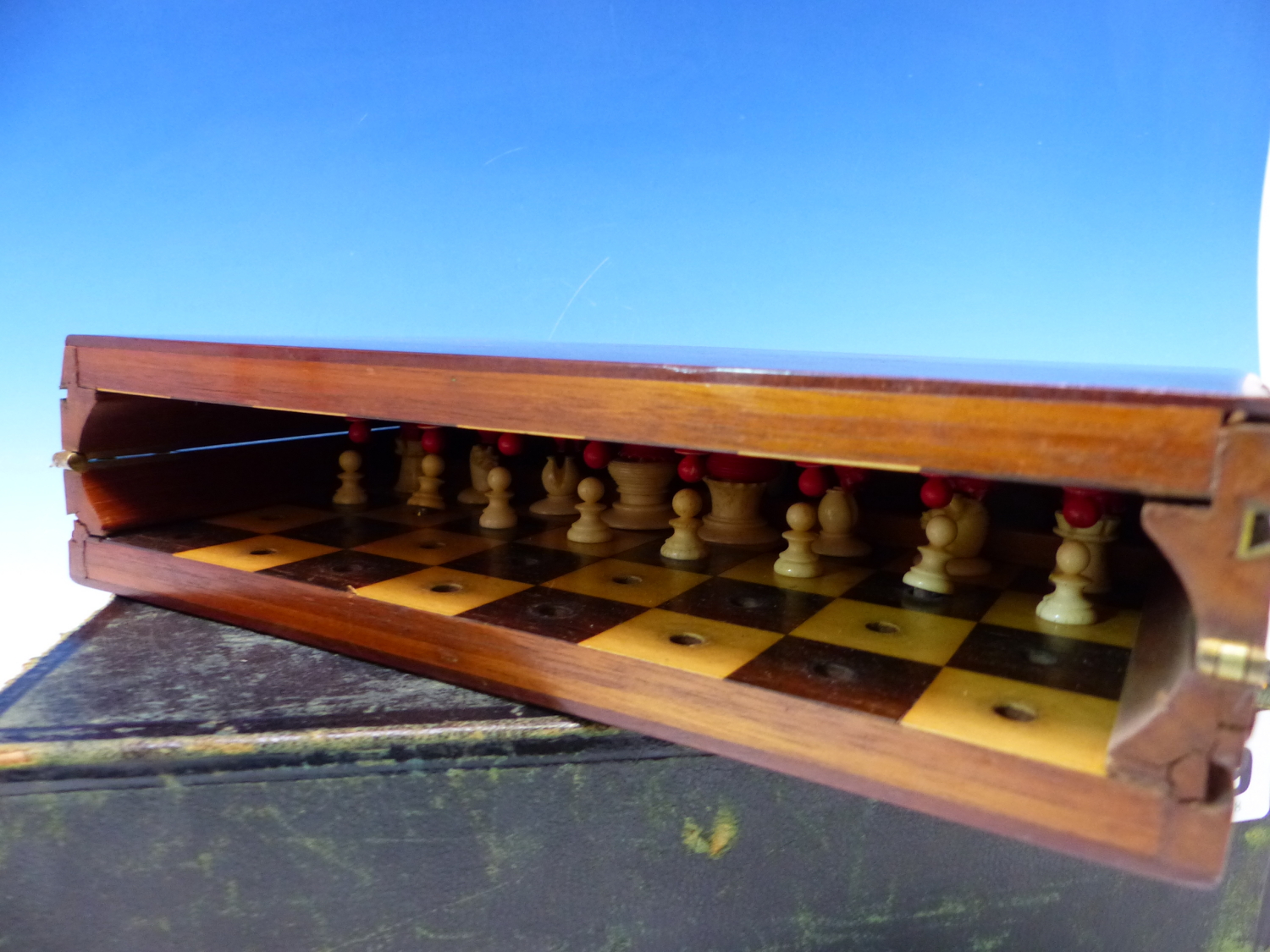 A JAQUES TRAVELLERS CHESS SET, THE MAHOGANY BOARD WITH LOCKS TO HOLD THE RED AND WHITE PIECES IN - Image 11 of 16