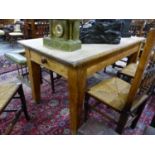AN ANTIQUE PINE TABLE WITH DRAWERS AT EACH NARROW END ABOVE TAPERING SQUARE LEGS. W 152 x D 76 x H
