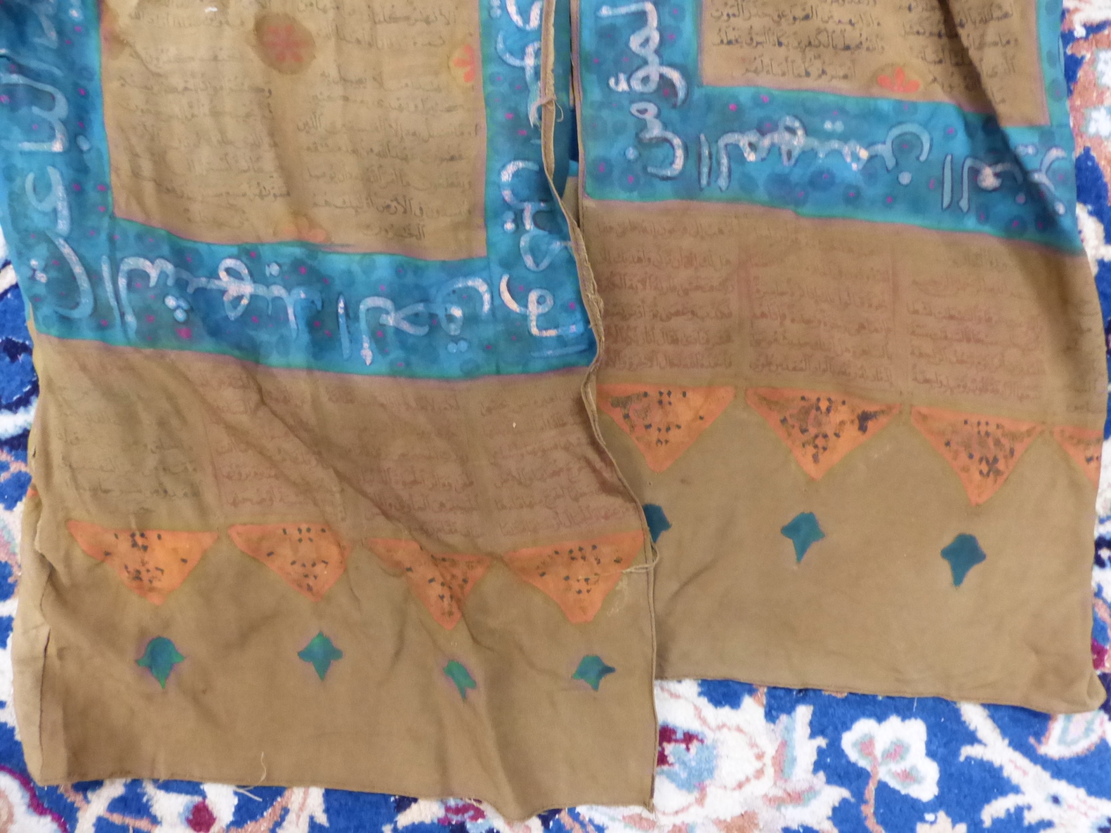 AN ISLAMIC TALISMANIC BROWN TUNIC PAINTED WITH BLUE EDGING AND ORANGE DETAILS ABOUT INSCRIPTIONS - Image 4 of 8