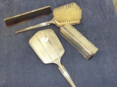 A HALLMARKED SILVER DRESSING TABLE SET