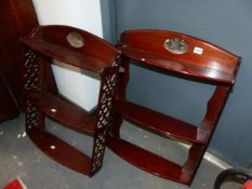 A PAIR OF LATE 19th/EARLY 20th C. MAHOGANY WALL SHELVES, EACH CRESTING CENTRED BY AN INSET OVAL