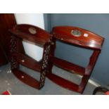 A PAIR OF LATE 19th/EARLY 20th C. MAHOGANY WALL SHELVES, EACH CRESTING CENTRED BY AN INSET OVAL