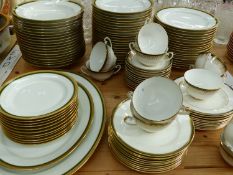 AN EXTENSIVE PART DINNER SERVICE, LIMOGES, FRANCE, J. POUYAT