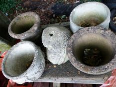 FIVE VARIOUS ANTIQUE AND VINTAGE GARDEN URNS, TOGETHER WITH A FIRE BUCKET (6).
