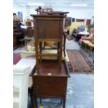 AN ANTIQUE MAHOGANY BEDSIDE CABINET AND A SEWING BOX.