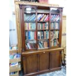 A VICTORIAN MAHOGANY GLAZED BOOKCASE.