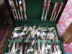 A SILVER PLATED CANTEEN OF CUTLERY.