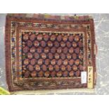 AN ANTIQUE PERSIAN TRIBAL BAG FACE, 74 x 65cms