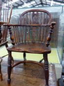 AN ANTIQUE WINDSOR CHAIR WITH TRIPLE PIERCED SPLAT FLANKED BY THREE STICKS, THE SADDLE SEAT ABOVE BA