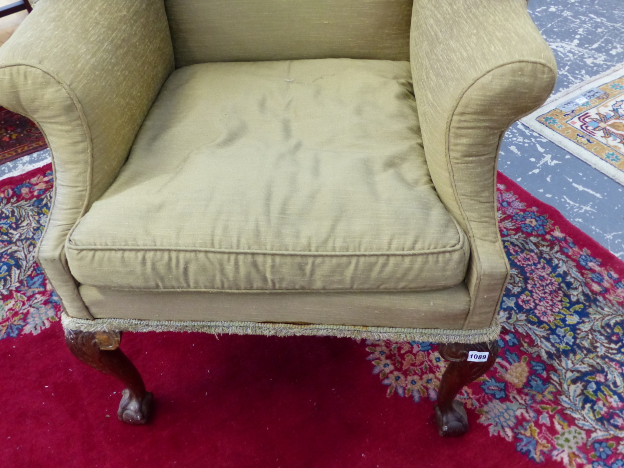 A 19th C. WING ARMCHAIR UPHOLSTERED IN OLIVE GREEN, THE CABRIOLE FRONT LEGS CARVED WITH LEAVES AT - Image 2 of 13