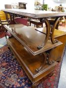 A 19th C. MAHOGANY THREE TIER BUFFET WITH BACK TO BACK C-SCROLL SUPPORTS AND PAIRS OF SCROLL FEET TO