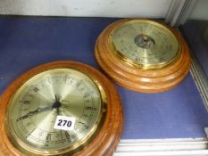 A WALL BAROMETER AND CLOCK