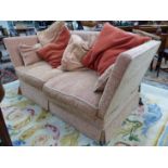 TWO KNOLE SETTEES, ONE WITH THREE SEATS AND THE OTHER WITH TWO UPHOLSTERED IN PINK GROUND WHITE FLOR