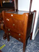 AN ANTIQUE MAHOGANY TRAY TOP NIGHT STAND.